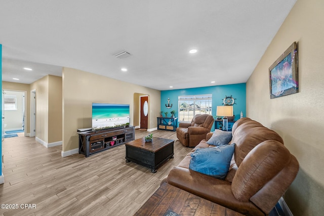 living room with light wood-type flooring