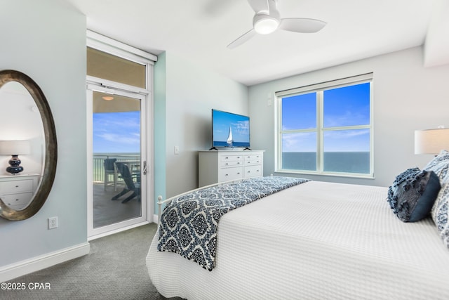 carpeted bedroom with multiple windows, access to exterior, and ceiling fan