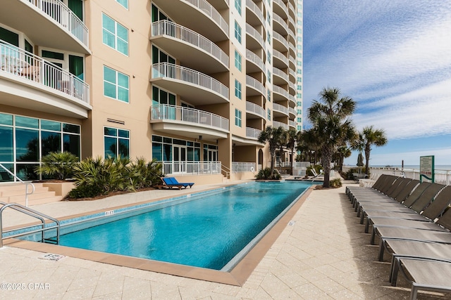 view of pool featuring a patio area