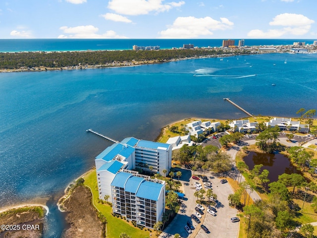 birds eye view of property with a water view