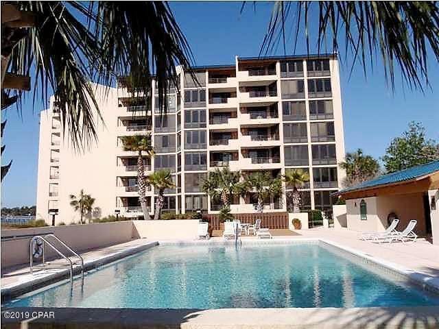 community pool with a patio area