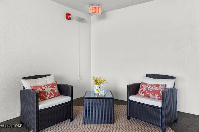 4600 Kingfish Ln Unit 508, Panama City, FL 32408 - sitting room featuring carpet flooring
