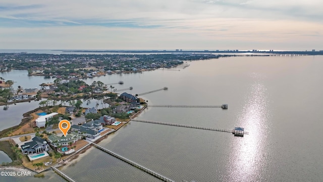 aerial view at dusk with a water view