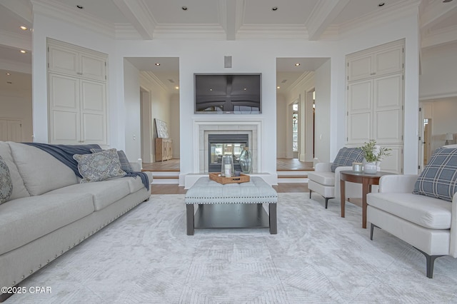 living room featuring beam ceiling and ornamental molding