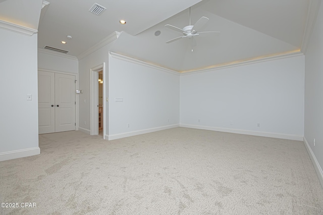 unfurnished room featuring light colored carpet, ornamental molding, and ceiling fan