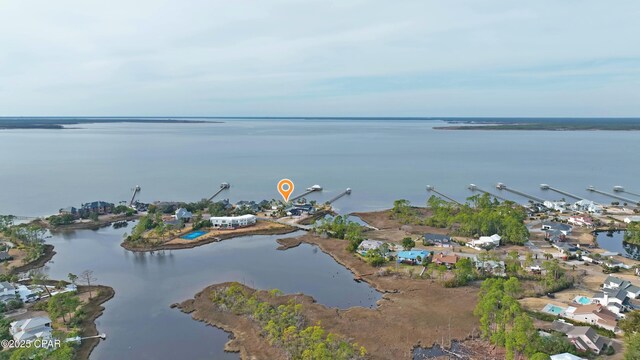 drone / aerial view featuring a water view