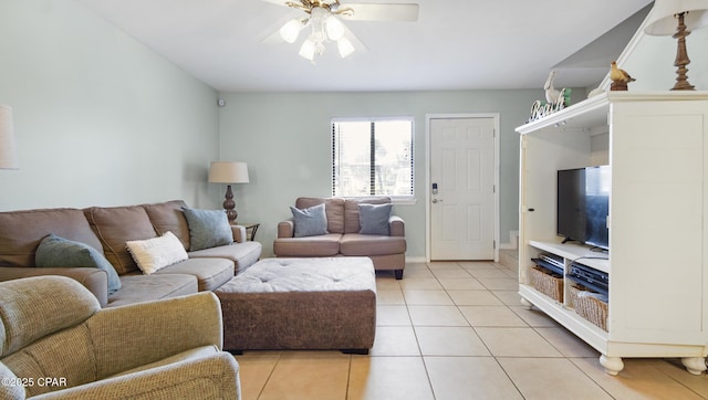 tiled living room featuring ceiling fan