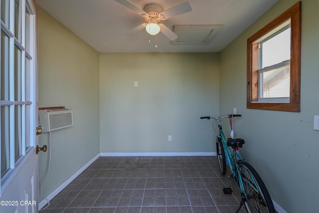 interior space featuring cooling unit and ceiling fan