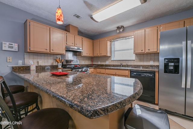 kitchen with sink, a breakfast bar area, decorative light fixtures, kitchen peninsula, and stainless steel appliances