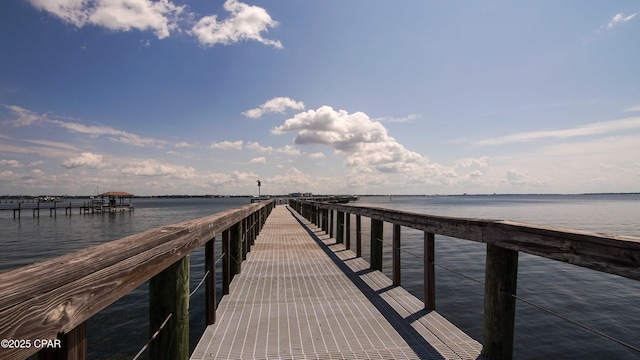 view of dock with a water view