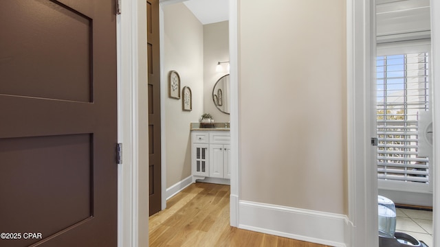 hallway with light wood-type flooring