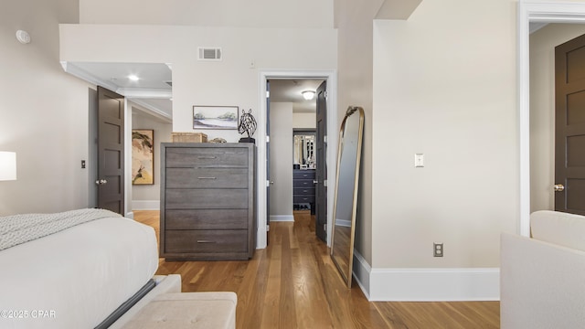 bedroom with light hardwood / wood-style floors