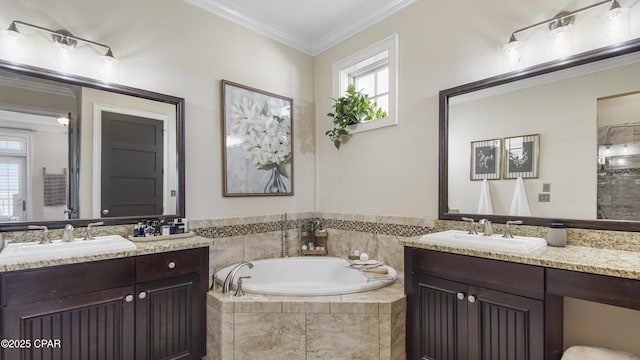 bathroom with vanity, a wealth of natural light, and ornamental molding