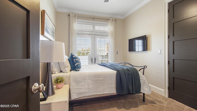 bedroom with crown molding, access to outside, and carpet