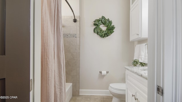 full bathroom featuring toilet, vanity, tile patterned floors, and shower / bath combo with shower curtain