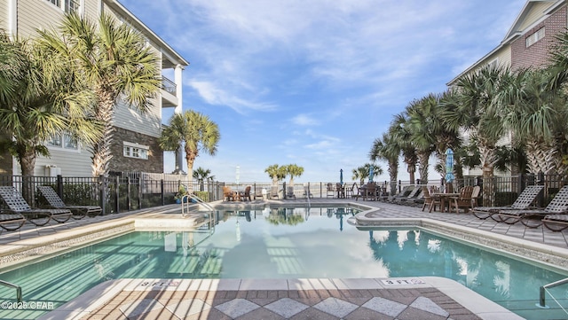 view of swimming pool featuring a patio