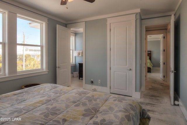 bedroom with crown molding