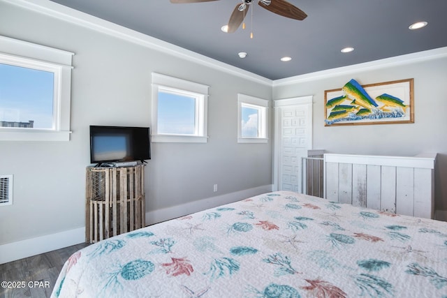 bedroom featuring dark wood-type flooring and ceiling fan