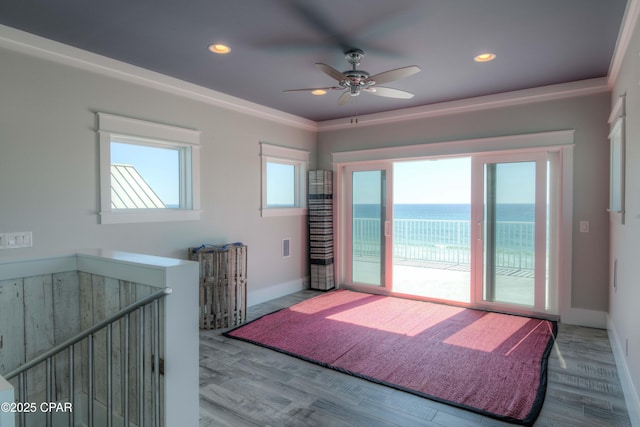 bedroom featuring a water view, ceiling fan, access to exterior, and light hardwood / wood-style floors