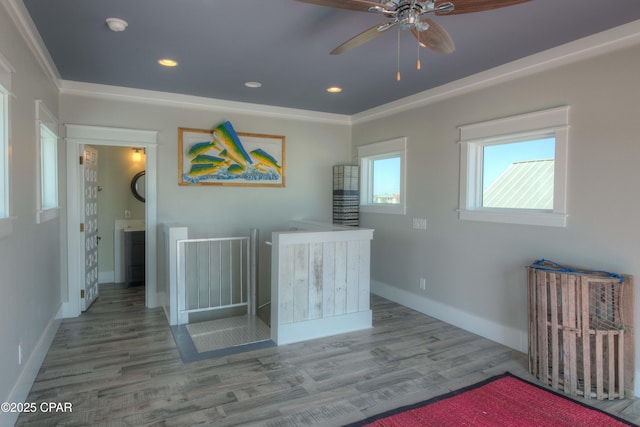 interior space with hardwood / wood-style flooring and ceiling fan