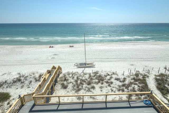 view of water feature with a beach view