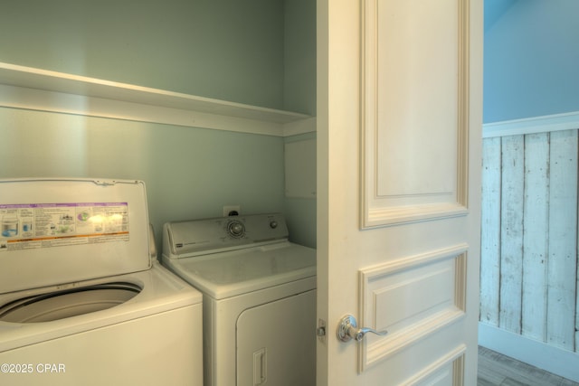 clothes washing area featuring washing machine and dryer