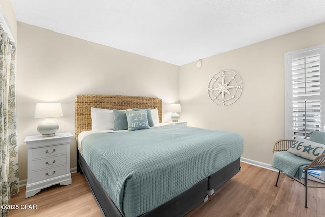 bedroom featuring light hardwood / wood-style floors