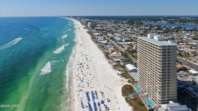 aerial view featuring a water view and a view of the beach