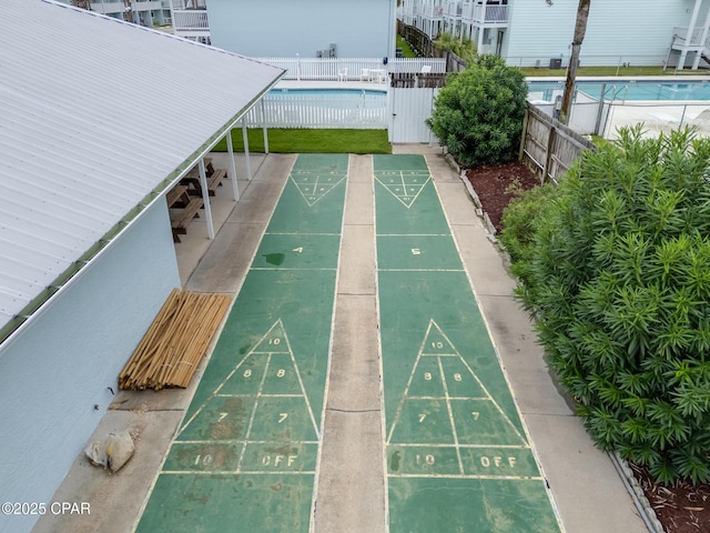 view of property's community featuring a pool