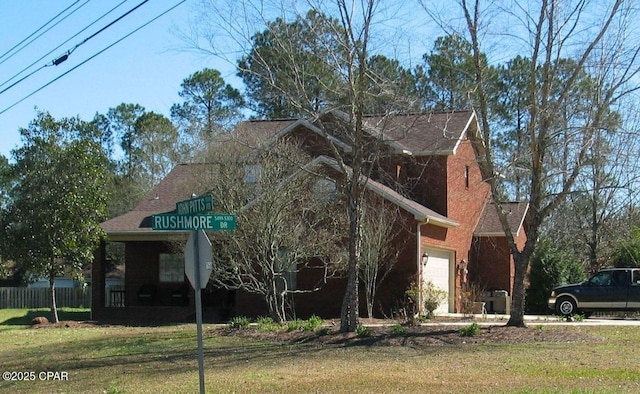 view of front of home with a front lawn