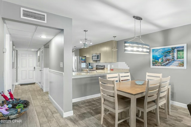 dining area featuring sink