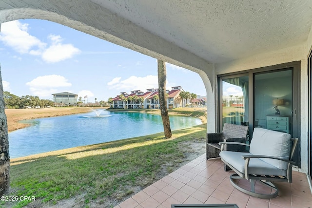 view of patio / terrace featuring a water view