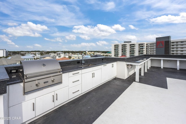 view of patio / terrace with sink, grilling area, and exterior kitchen