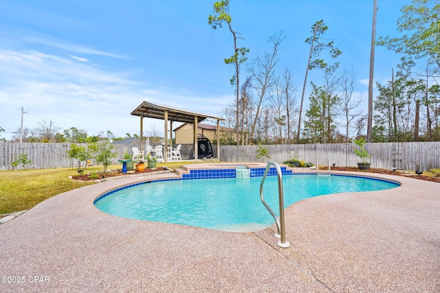 view of swimming pool with a patio area, a fenced backyard, and a fenced in pool