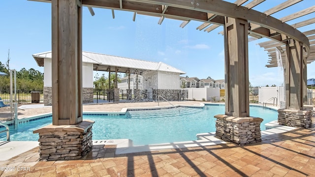 pool featuring a patio area, fence, and a pergola