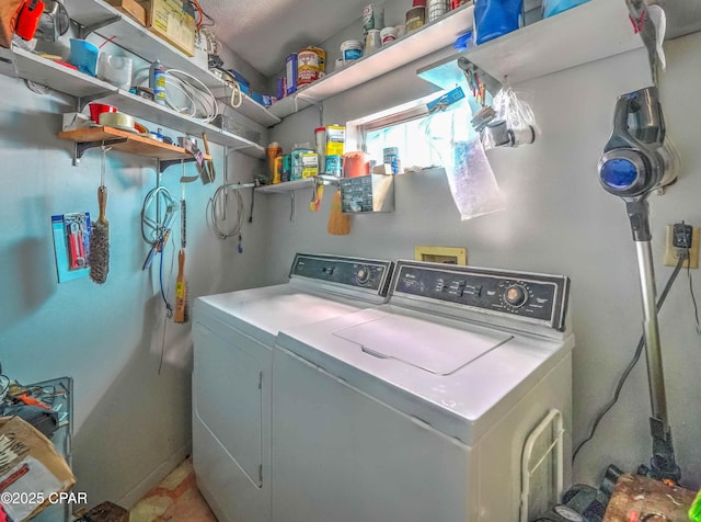 423 Snook Ln, Panama City Beach, FL 32408 - clothes washing area with washing machine and clothes dryer