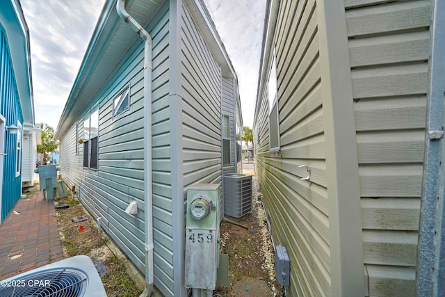 423 Snook Ln, Panama City Beach, FL 32408 - view of side of home with central AC