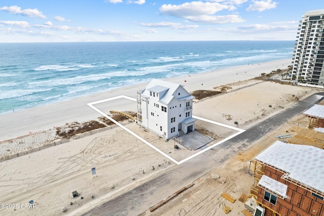 aerial view featuring a beach view and a water view