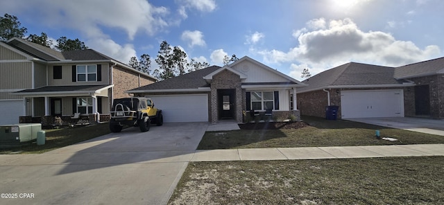 view of front of house featuring a garage and a front yard