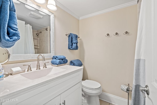 bathroom featuring crown molding, toilet, vanity, tile patterned flooring, and baseboards