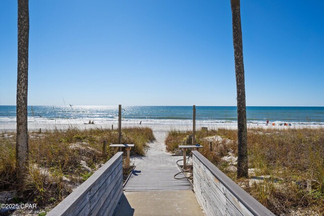 view of water feature with a beach view