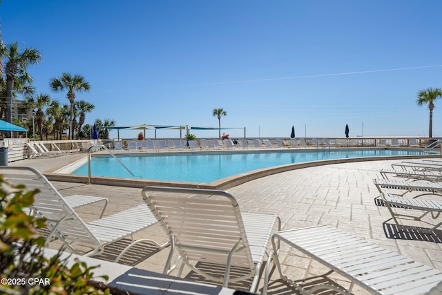 community pool with a patio