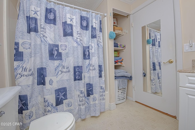 full bathroom featuring vanity, toilet, and shower / bath combo with shower curtain