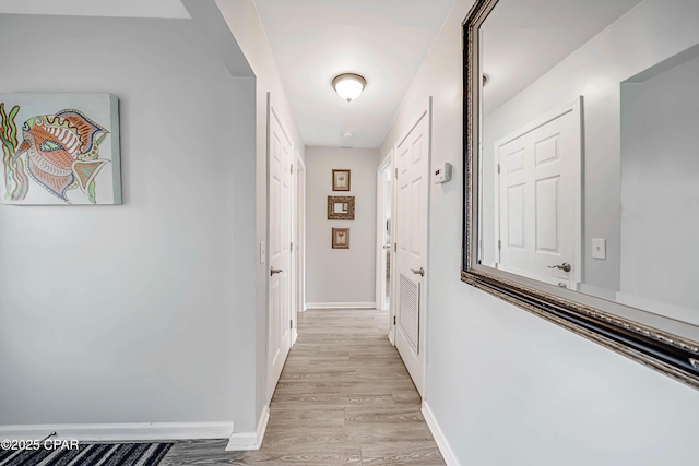 hall featuring light wood-type flooring