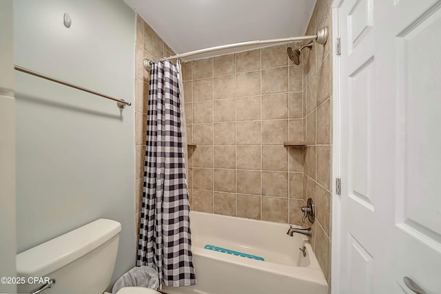 bathroom with toilet and shower / tub combo