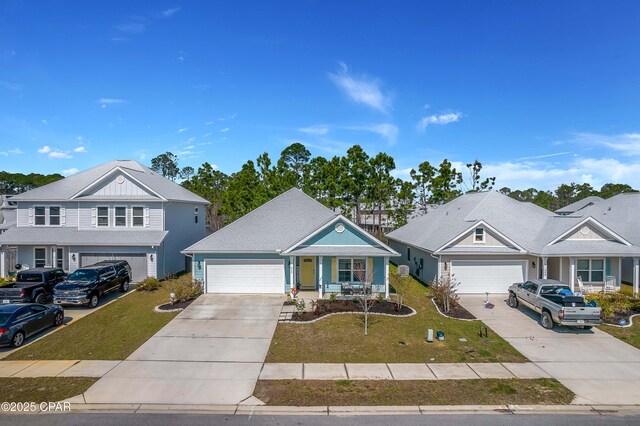 view of front of property with a garage, a front lawn, and covered porch