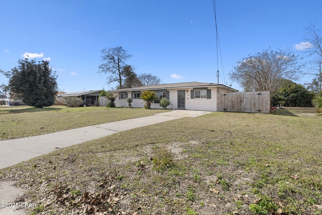 single story home with a front yard