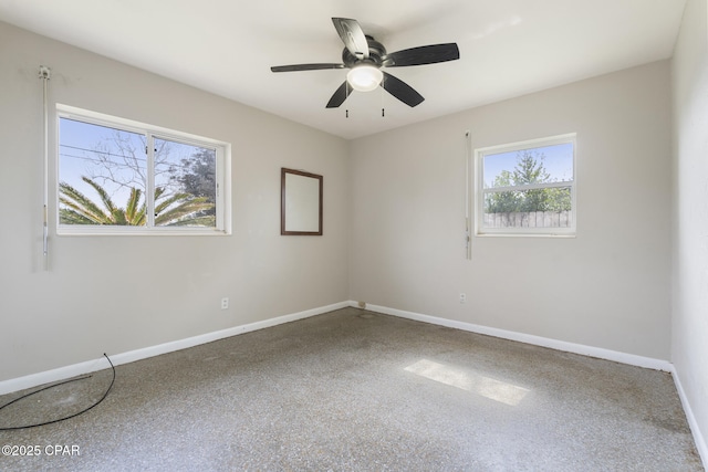 empty room featuring ceiling fan