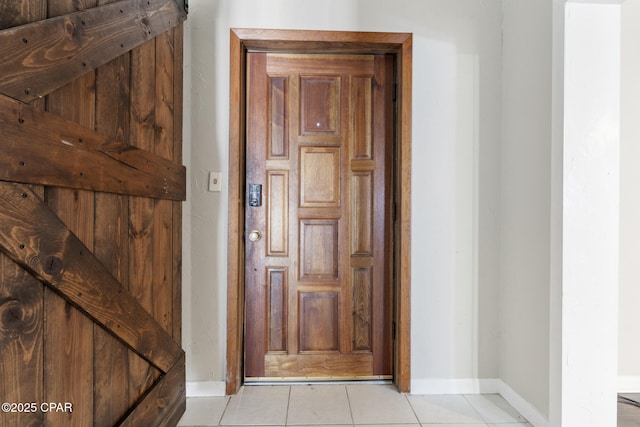 corridor featuring light tile patterned flooring