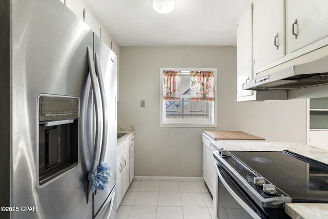 kitchen with electric stove, light tile patterned floors, white cabinets, and stainless steel fridge with ice dispenser